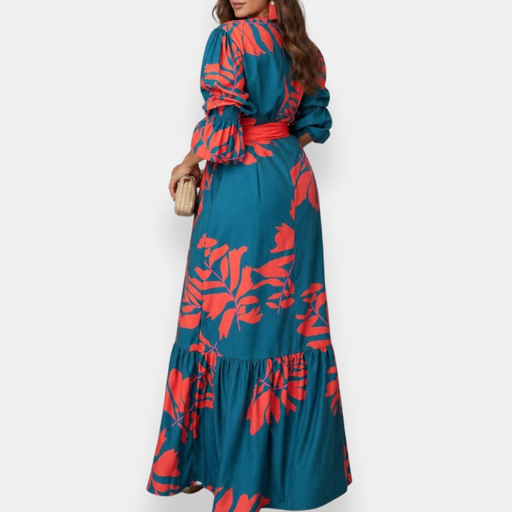 Nancy tropical floral maxi dress, full length showing the flowing skirt