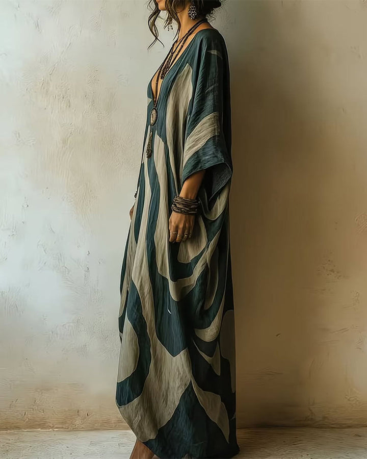 Frieda™ Abstract Print Kaftan Maxi Dress showing the wide sleeve and side drape