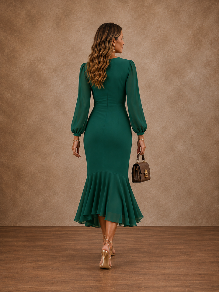 Octavia™ Ruched Mermaid Maxi Dress in green, back view showing the flared hem