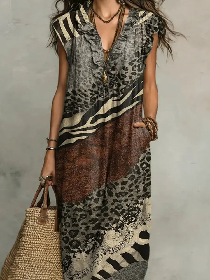 Shirley mixed print maxi dress, full length showing the flowing skirt